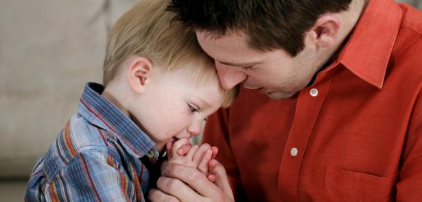 father and son praying