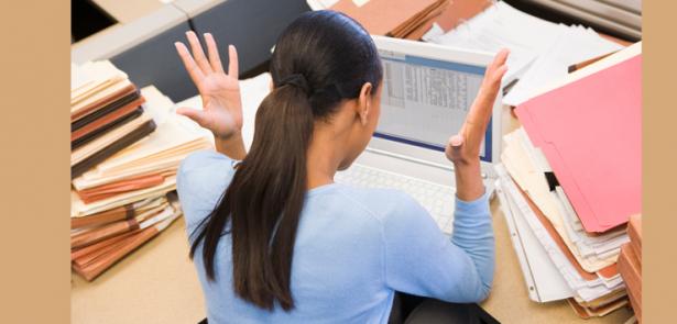woman stressed and throwing up her hands
